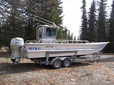 ATEC boat on trailer with Honda Outboard